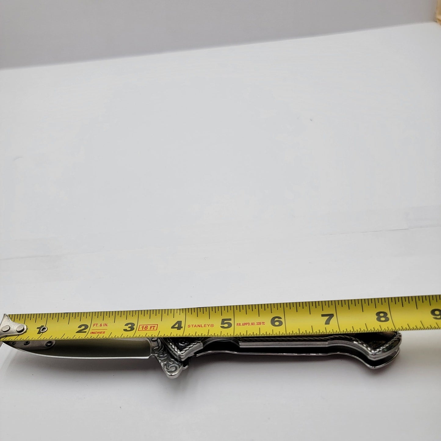 Running Wolves 4.5" Ivory Drop Point Collectible Folding Knife3