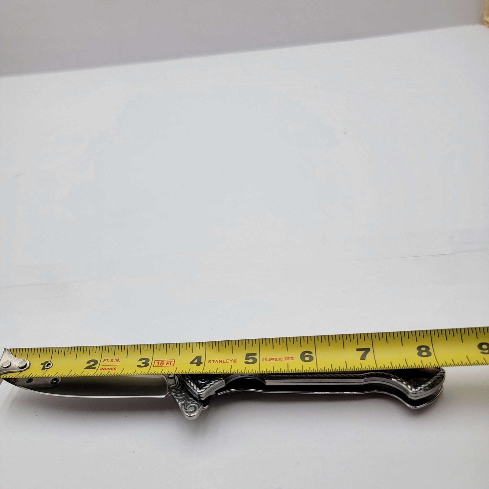 Running Wolves 4.5" Ivory Drop Point Collectible Folding Knife3
