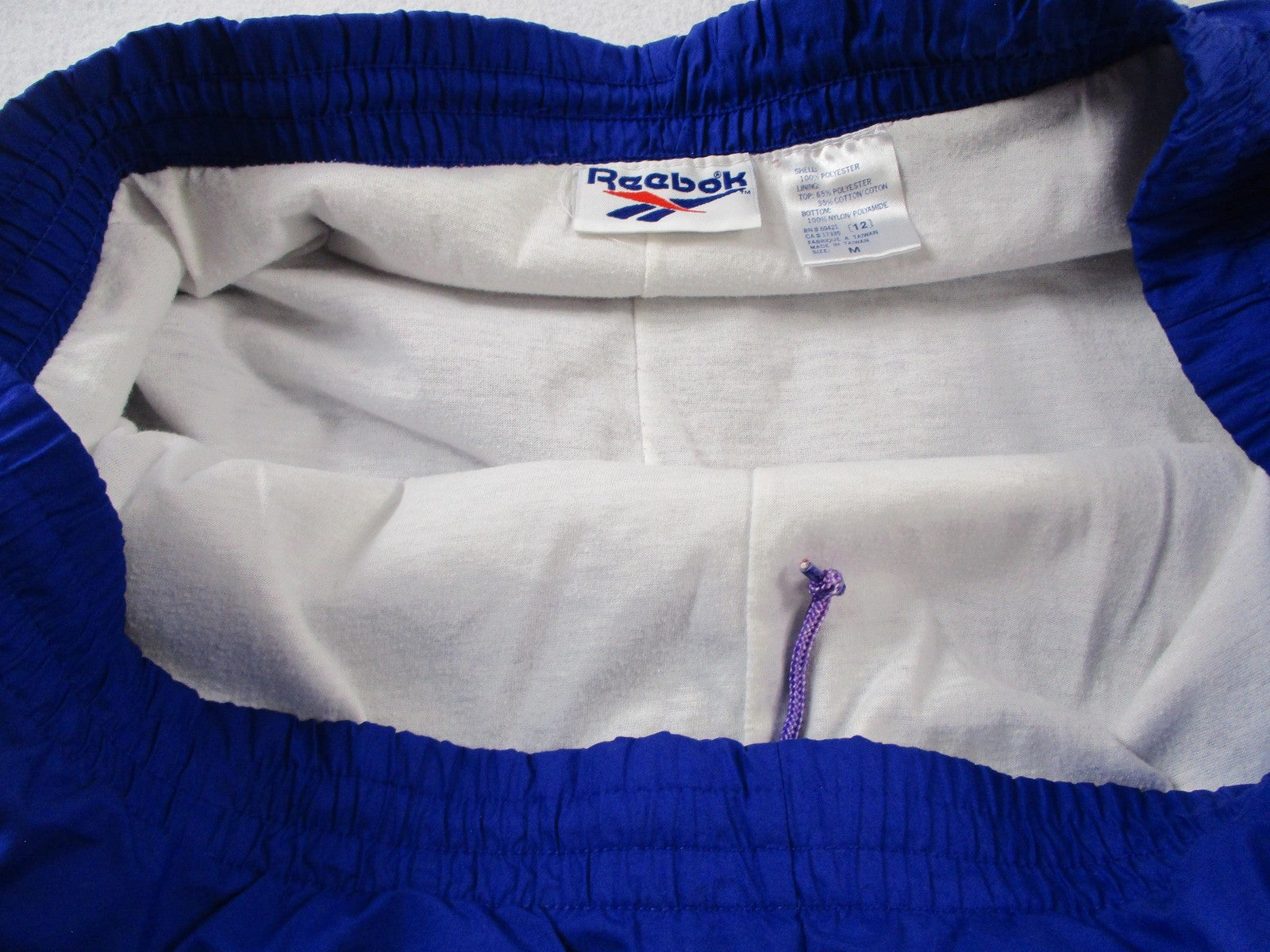 Vintage Reebok Track Pants Womens M Blue Warm Up Elastic Cuff Zip Pocket 14535