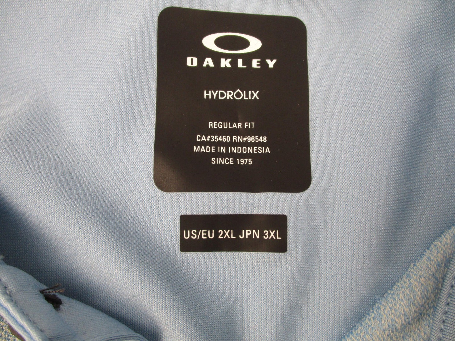 Oakley Reduct Hydrolix Polo Shirt Mens 2XL Blue Palm Tropical Graphic Golf 13162