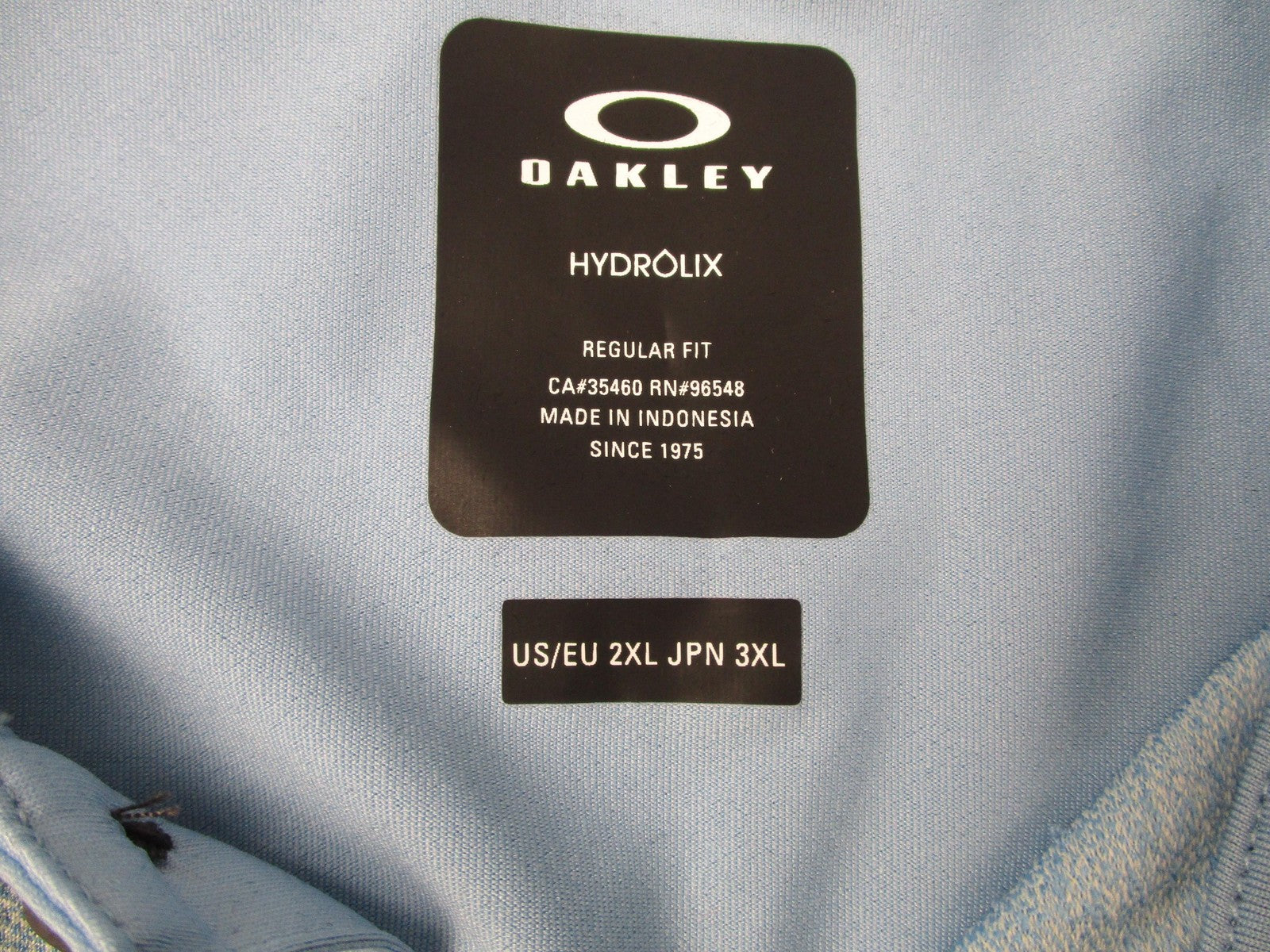 Oakley Reduct Hydrolix Polo Shirt Mens 2XL Blue Palm Tropical Graphic Golf 13162