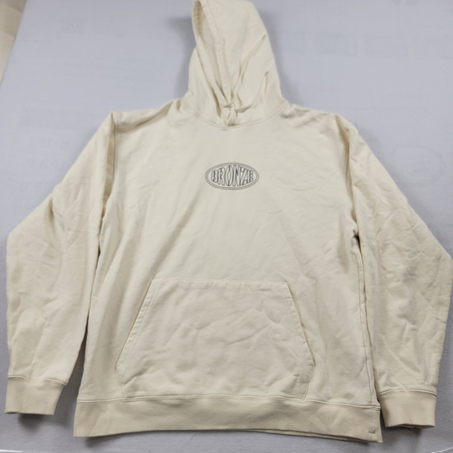 Bronze 56k Oval Hoodie Cream Sz XL