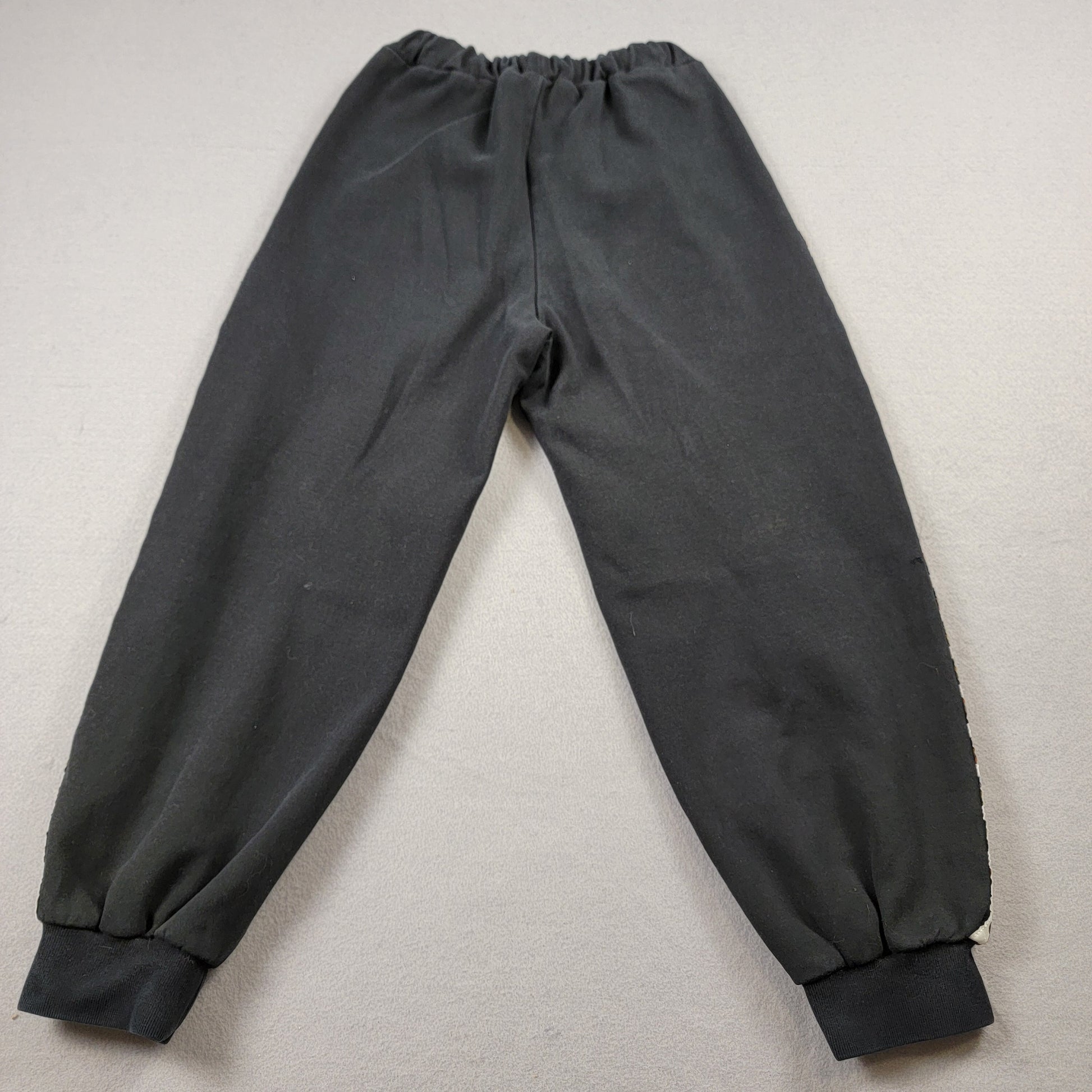Octopus-Me Kids Black Jogger Sweatpants Size M Cartoon Side Stripe Preowned1